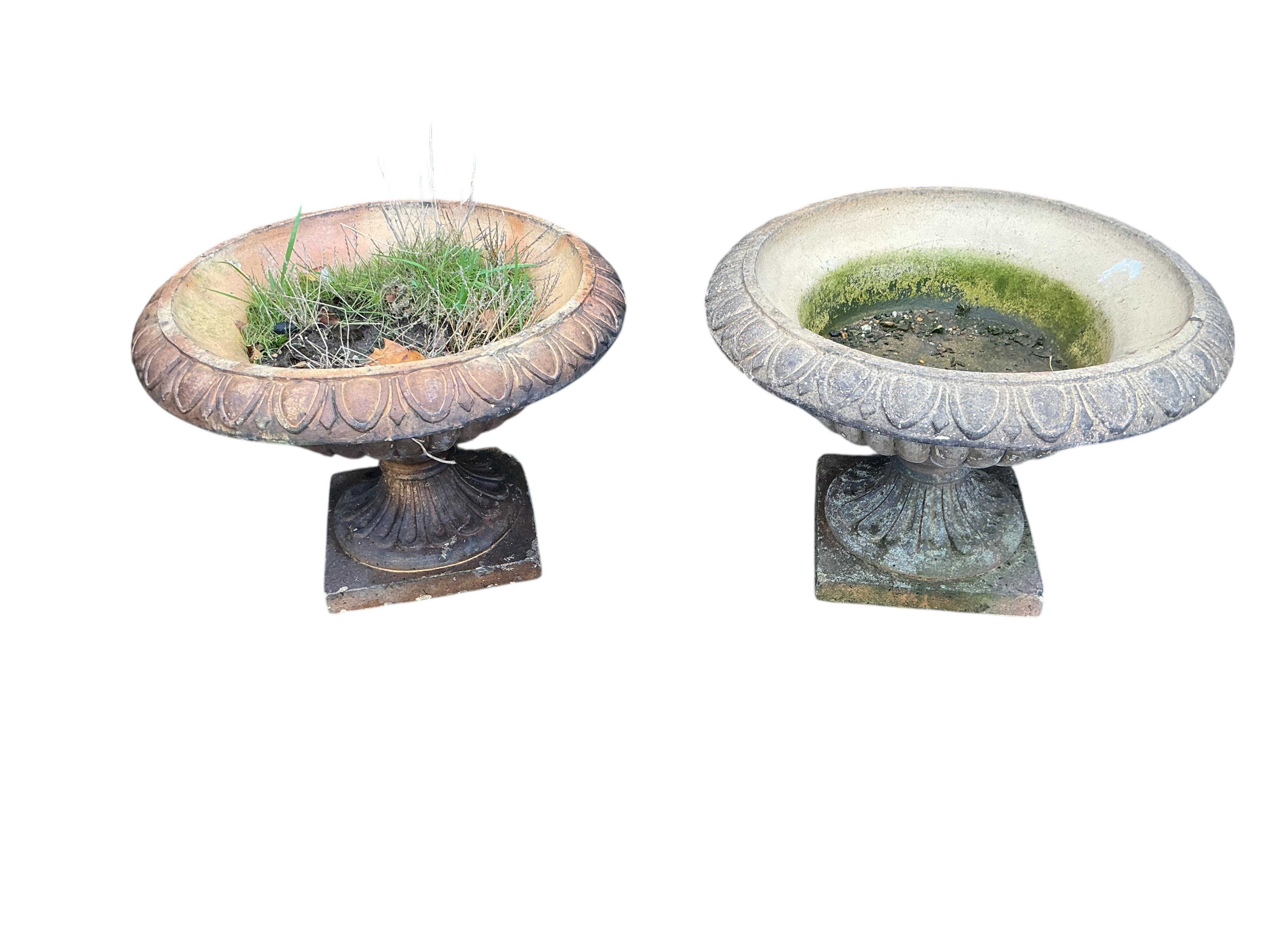 A pair of earthenware campana garden urns, diameter 54cm, height 37cm